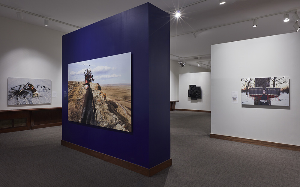 Installation view of the Montclair Art Museum’s exhibition, “Meryl McMaster: Chronologies” with “Echoes Across the Field”, 2022 on the left, “Edge of a Moment”, 2017 in the center, and “Time’s Gravity”, 2015 on the right. Photo: Jason Wyche/Montclair Art Museum.